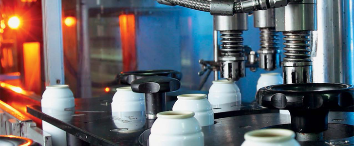 Porcelain cups being made in a factory